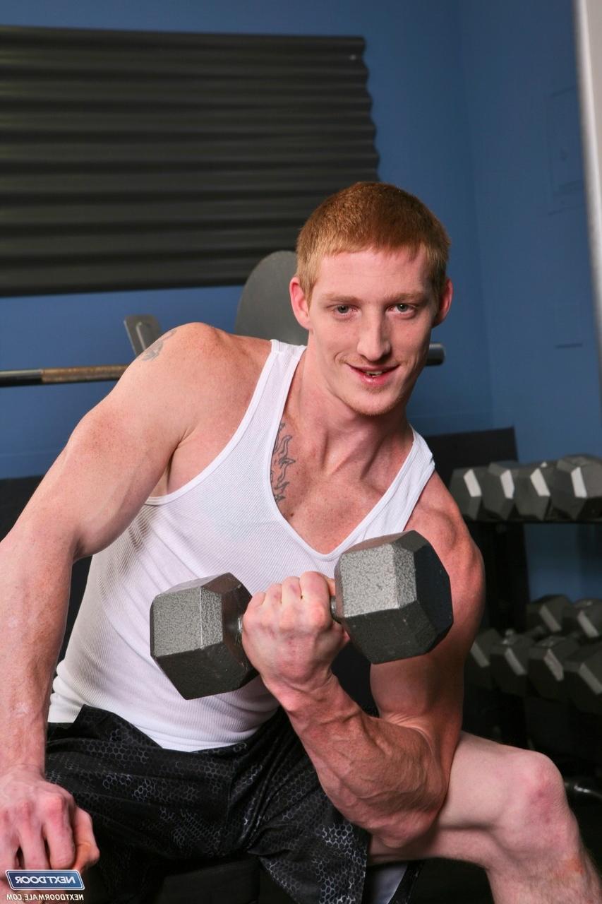 20P Inked ginger Max Thrust strips, shows his big dick and jerks off at the gym