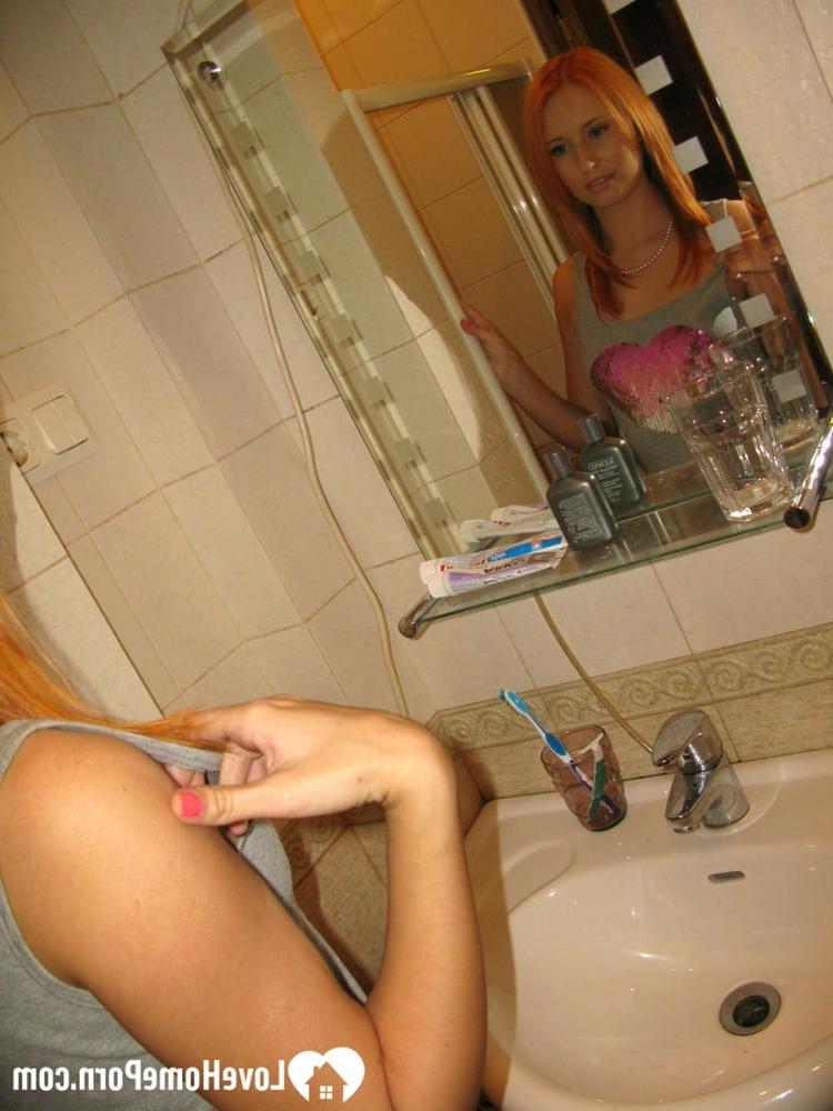 20P Skinny amateur ginger strips in the bathroom and takes a hot shower