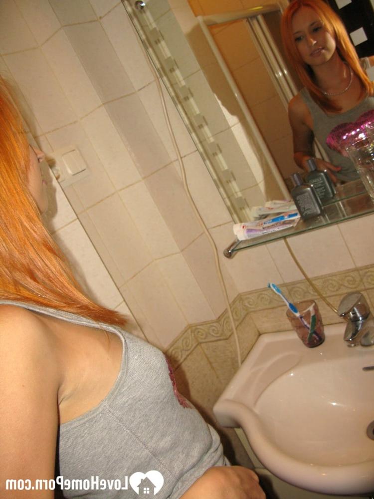 20P Skinny amateur ginger strips in the bathroom and takes a hot shower