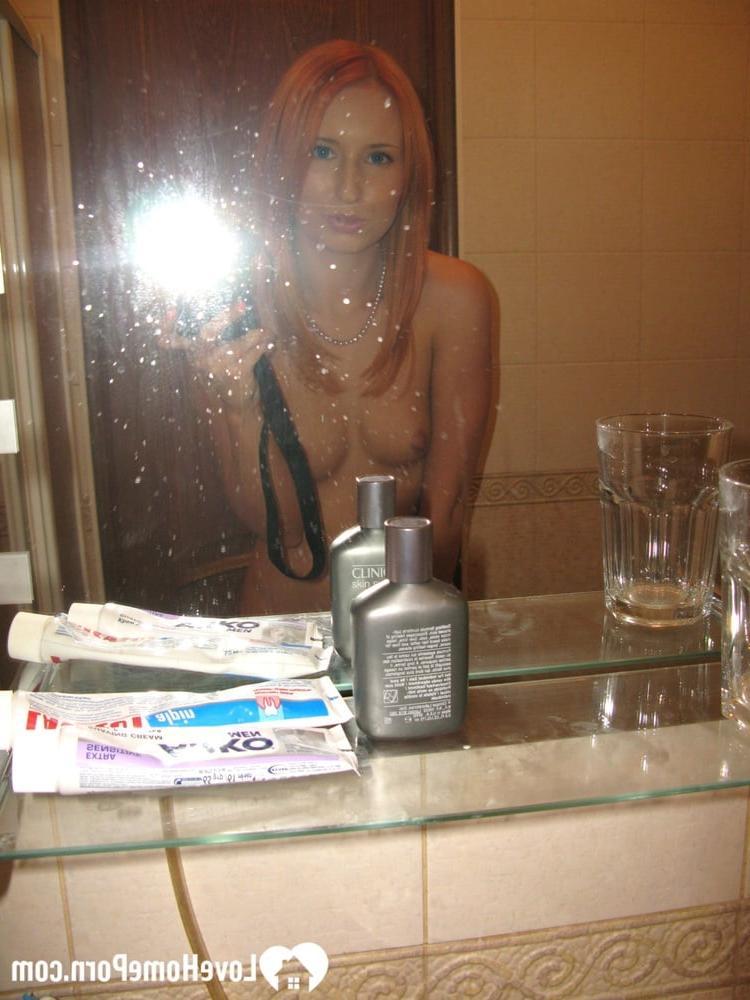 20P Skinny amateur ginger strips in the bathroom and takes a hot shower
