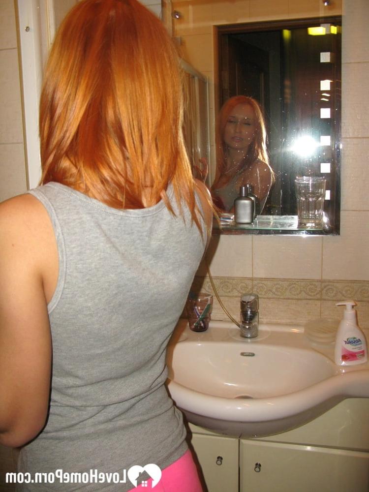 20P Skinny amateur ginger strips in the bathroom and takes a hot shower