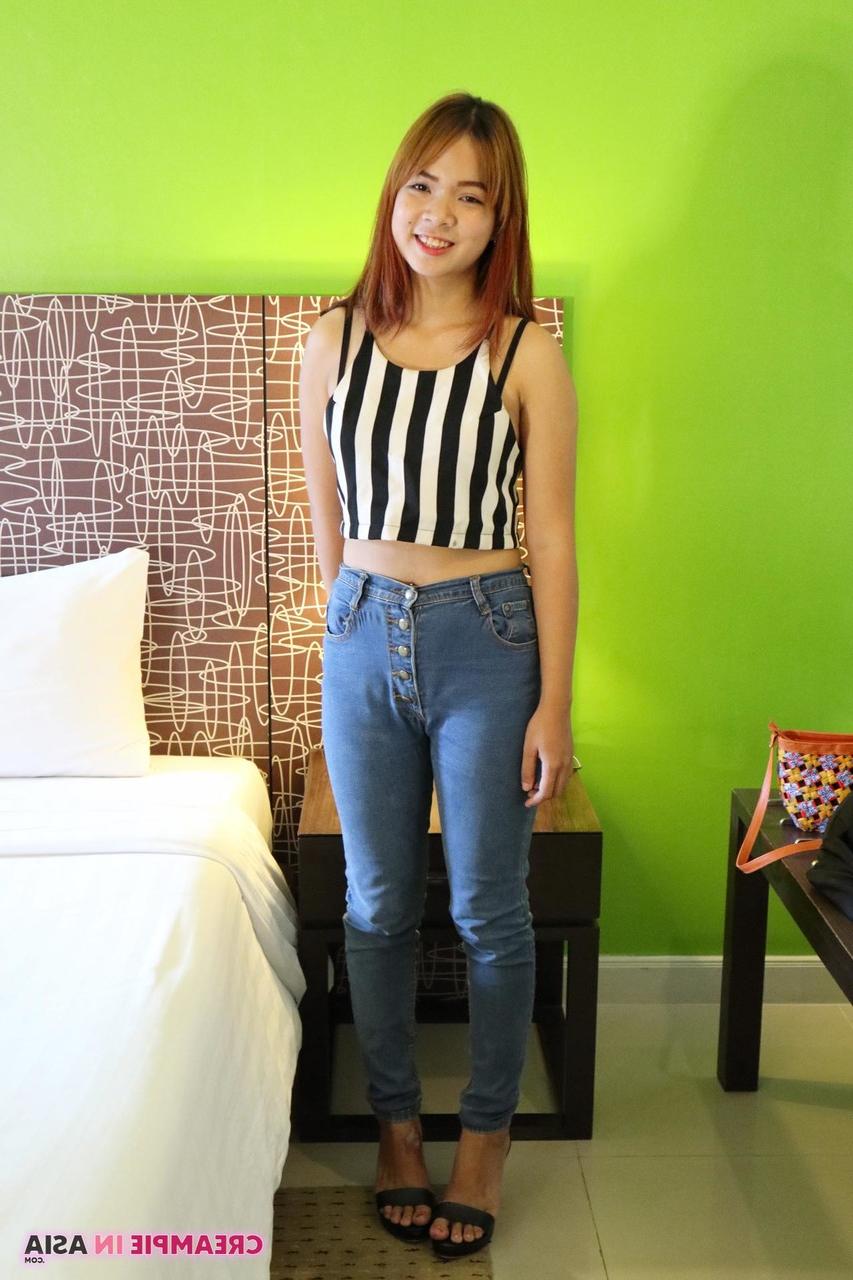 20P Cute Asian babe Muai strips to her heels & spreads her creamy pussy