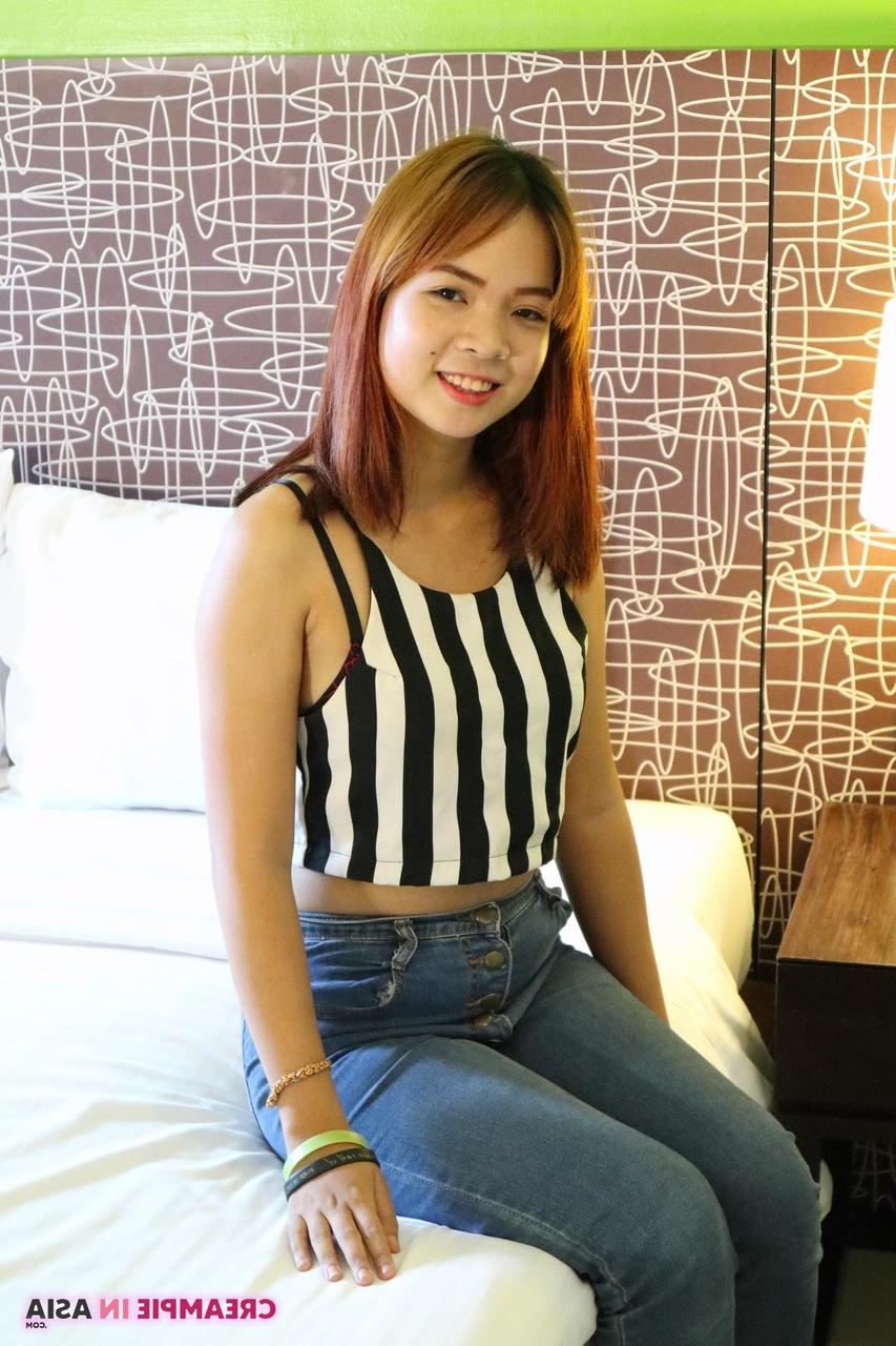 20P Cute Asian babe Muai strips to her heels & spreads her creamy pussy