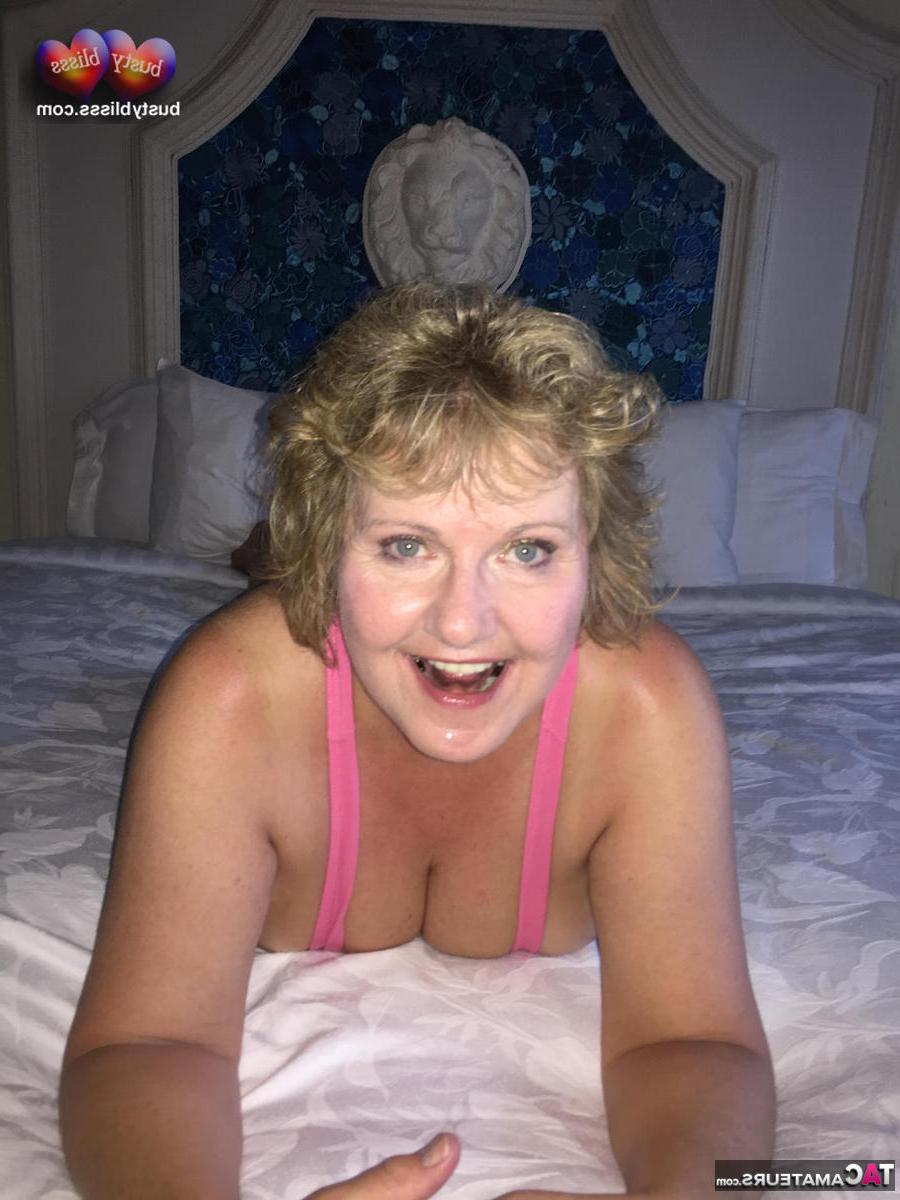 16P Chubby older lady Busty Bliss frees her tits and pussy on a bed