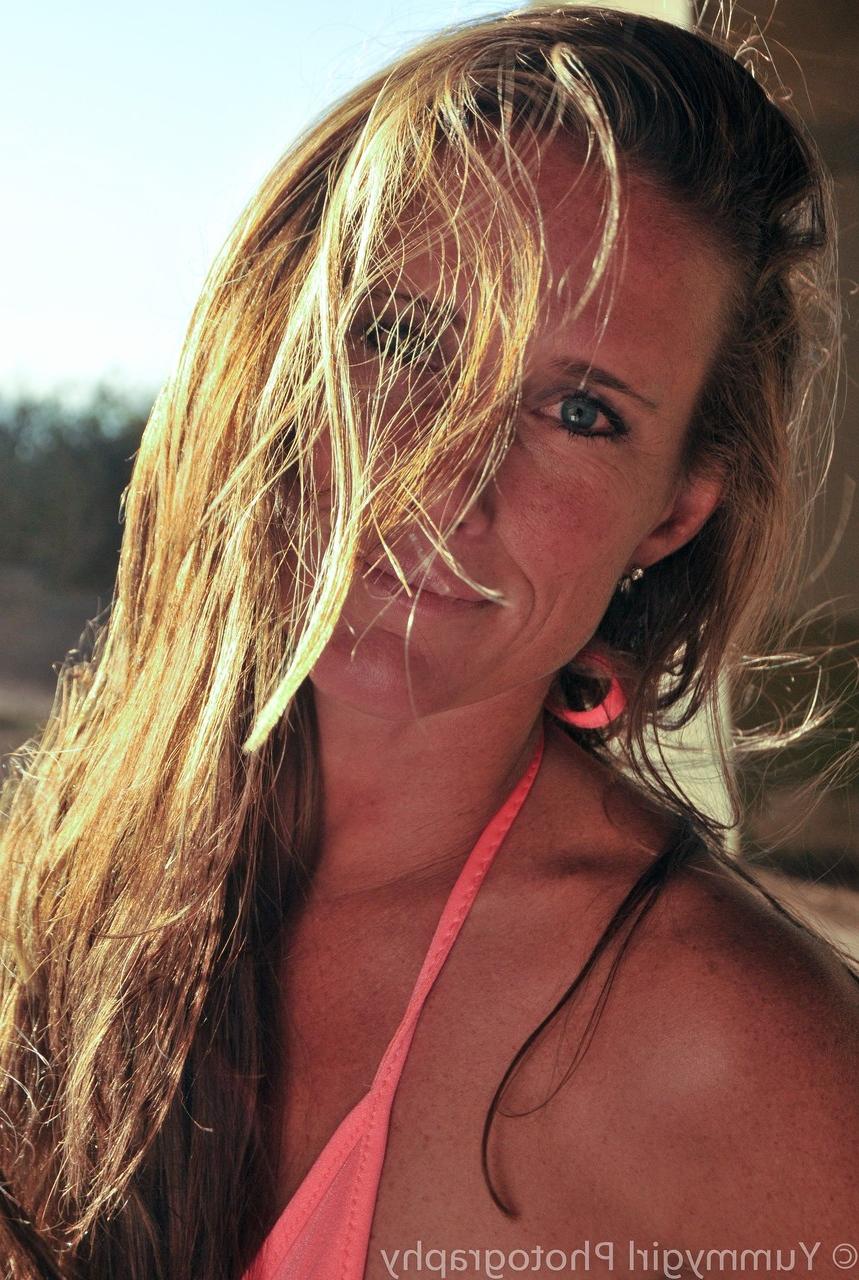 20P Brunette MILF Sofie Marie does a sexy outdoor tease wearing a bikini
