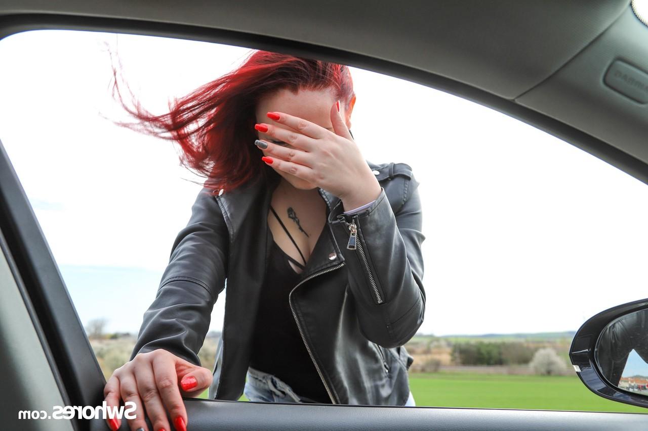 20P Redheaded prostitute Nina K giving a blowjob to a horny stranger in public