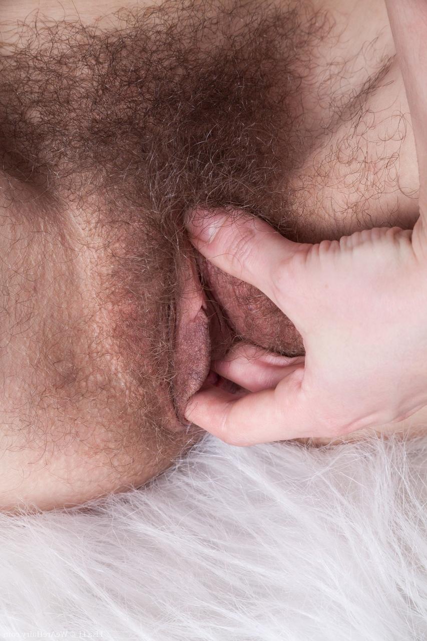 17P Petite Russian Lisa Li rubs her hairy muff and shows bushy asshole