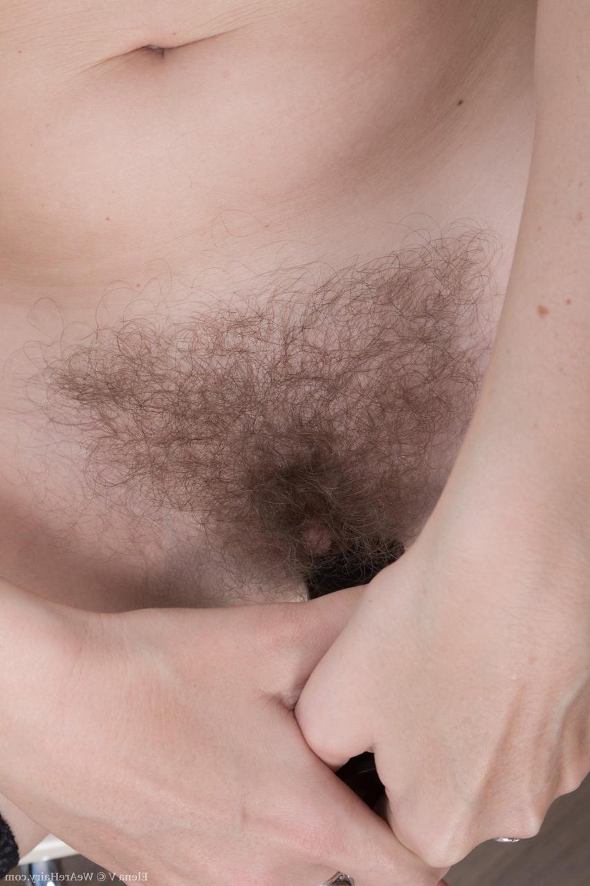 17P Stockinged MILF Elena V toying her wet hairy pussy in solo action
