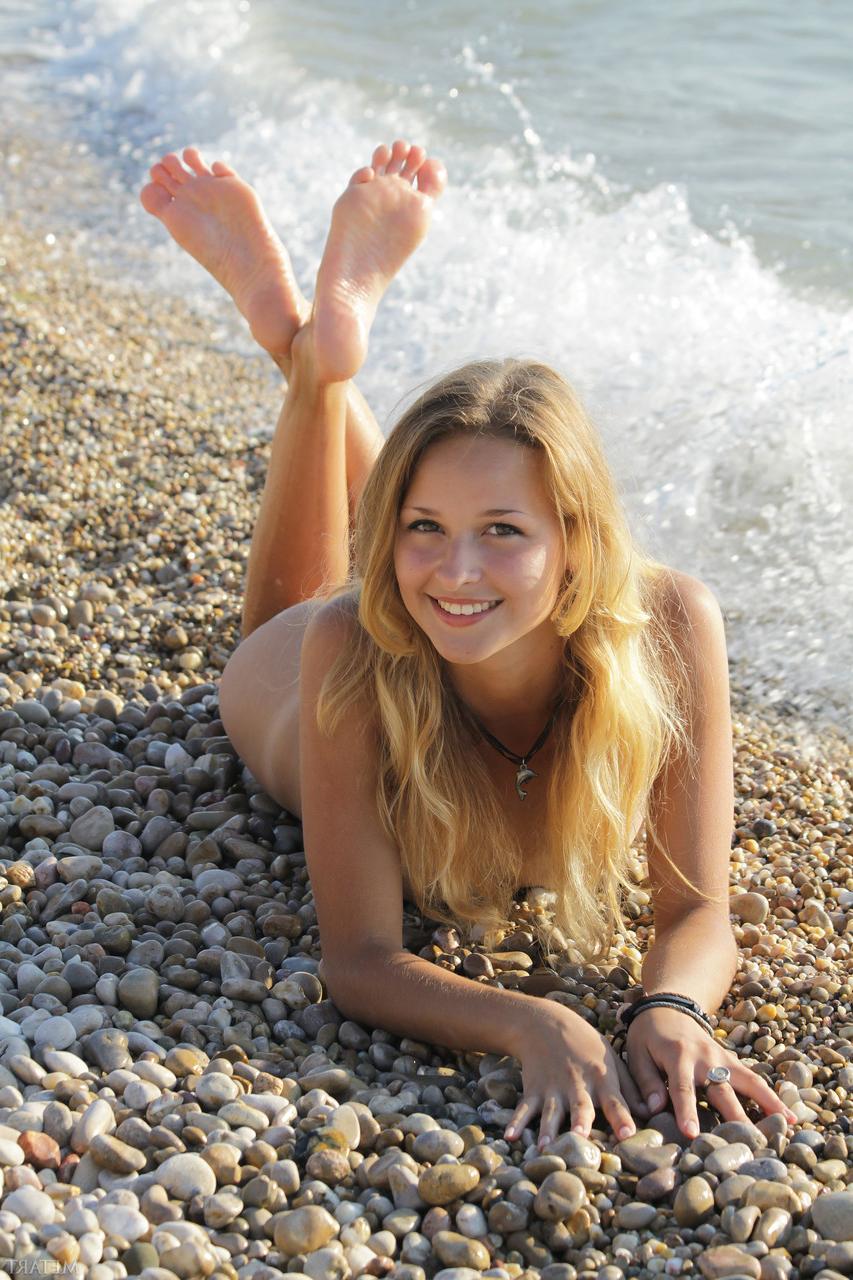 20P Glamorous babe Toxic A strips on the beach & unveils her body with tan lines