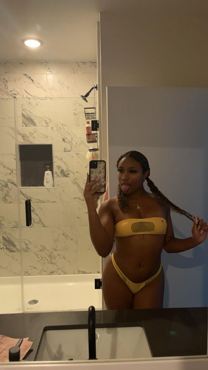 17P Curly haired ebony hottie Sky Alexxxis teases with her big ass & natural tits