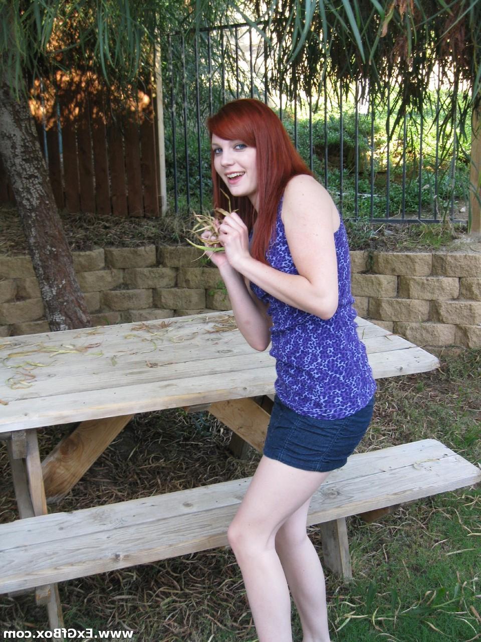 20P Redhead nympho Niccli reveals her tiny tits and poses nude all over the house
