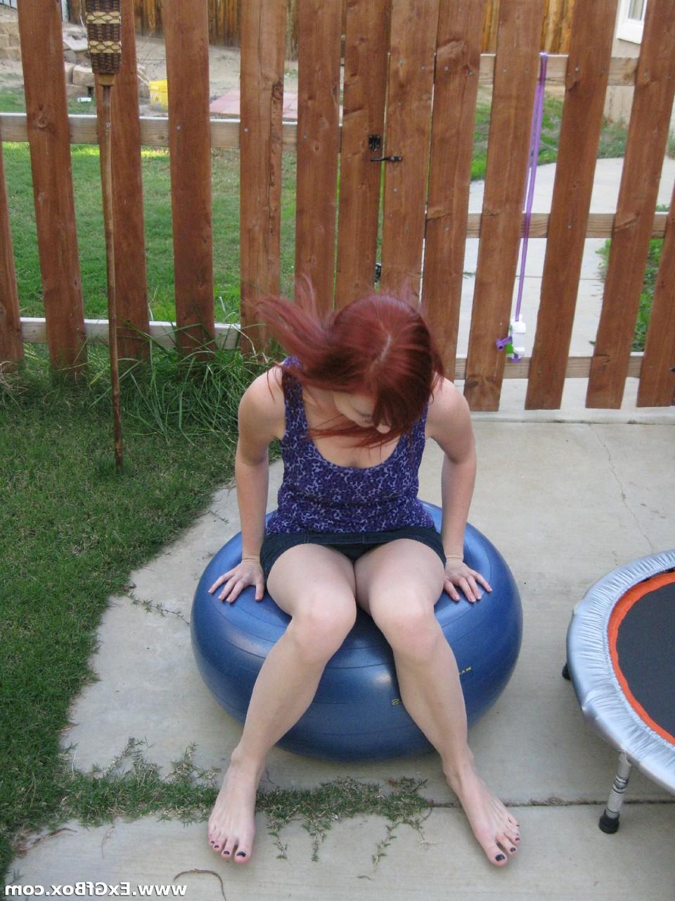 20P Redhead nympho Niccli reveals her tiny tits and poses nude all over the house