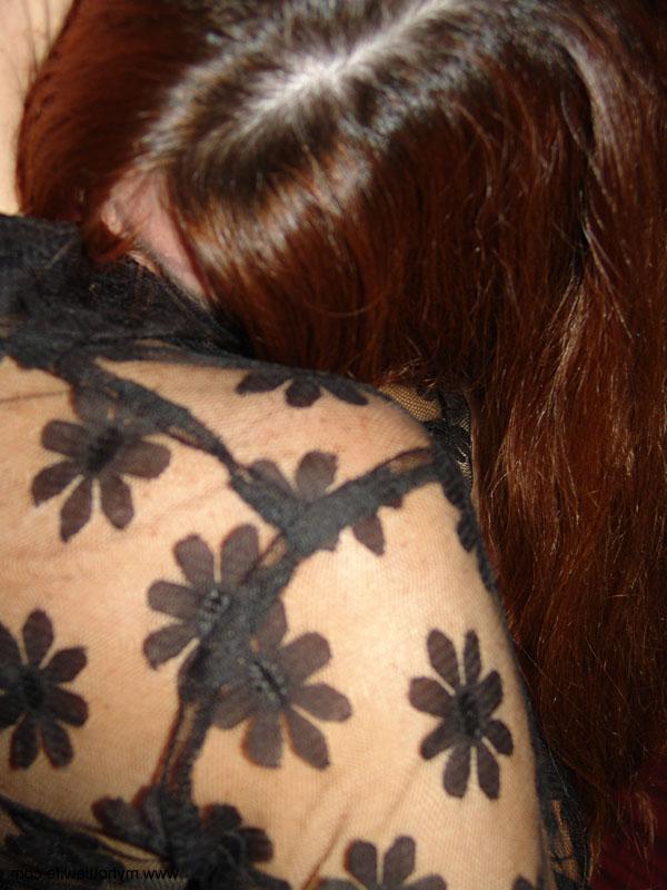 20P Sexy redheaded mature Double Dee gets naughty in a sexy skirt at a club