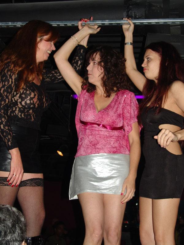 20P Sexy redheaded mature Double Dee gets naughty in a sexy skirt at a club