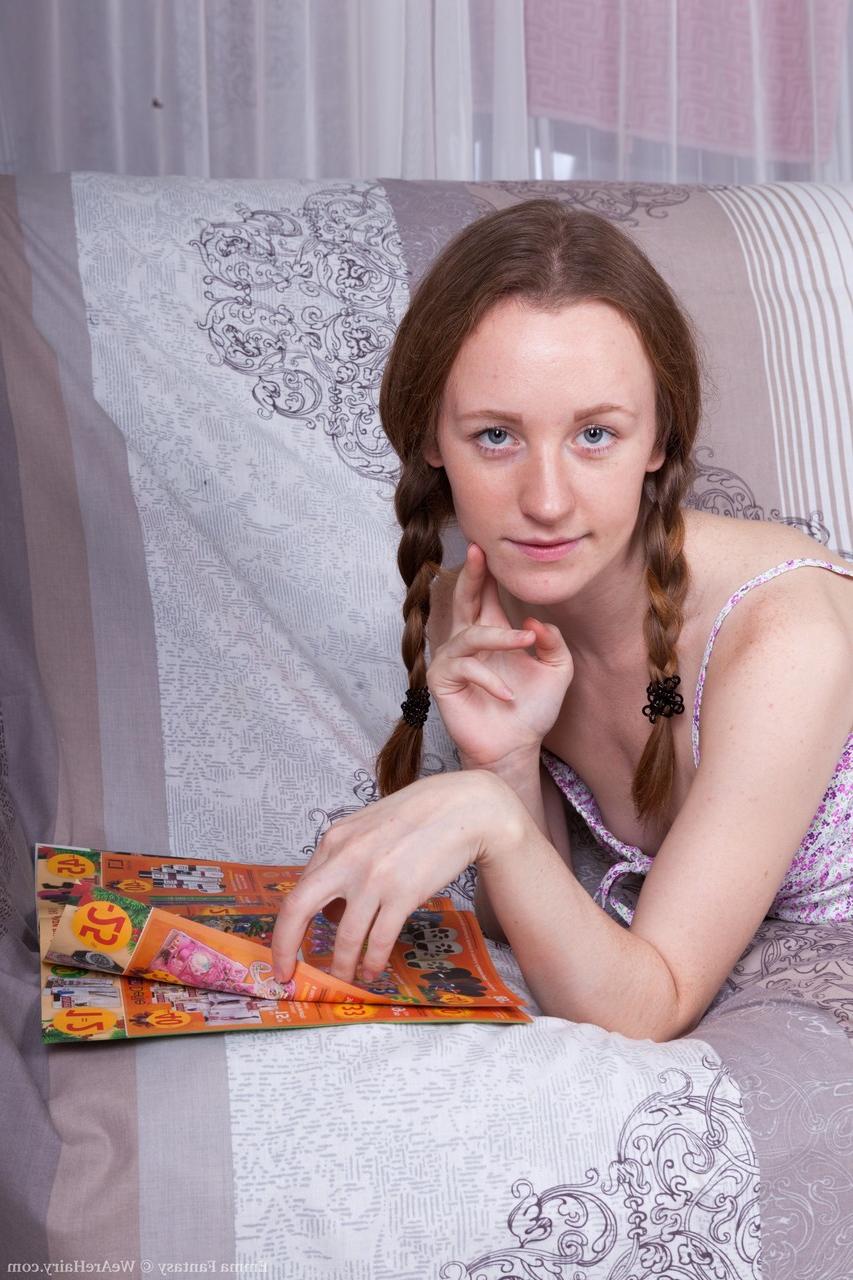 18P Pigtailed redhead Emma Fantasy takes off panties to toy her sweet hairy kitty