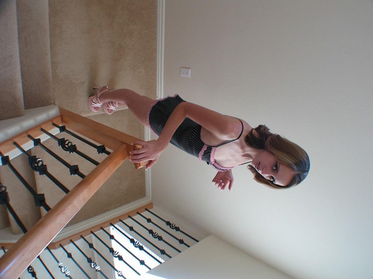 20P Blonde MILF Kelly Wells posing in her sexy lingerie & stripping on the stairs