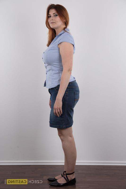 20P Overweight redhead Eva stands straight while clothed and totally naked too