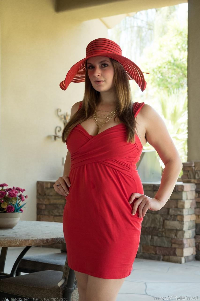 16P Solo model Danielle changes into a sun hat and dress before toying her twat