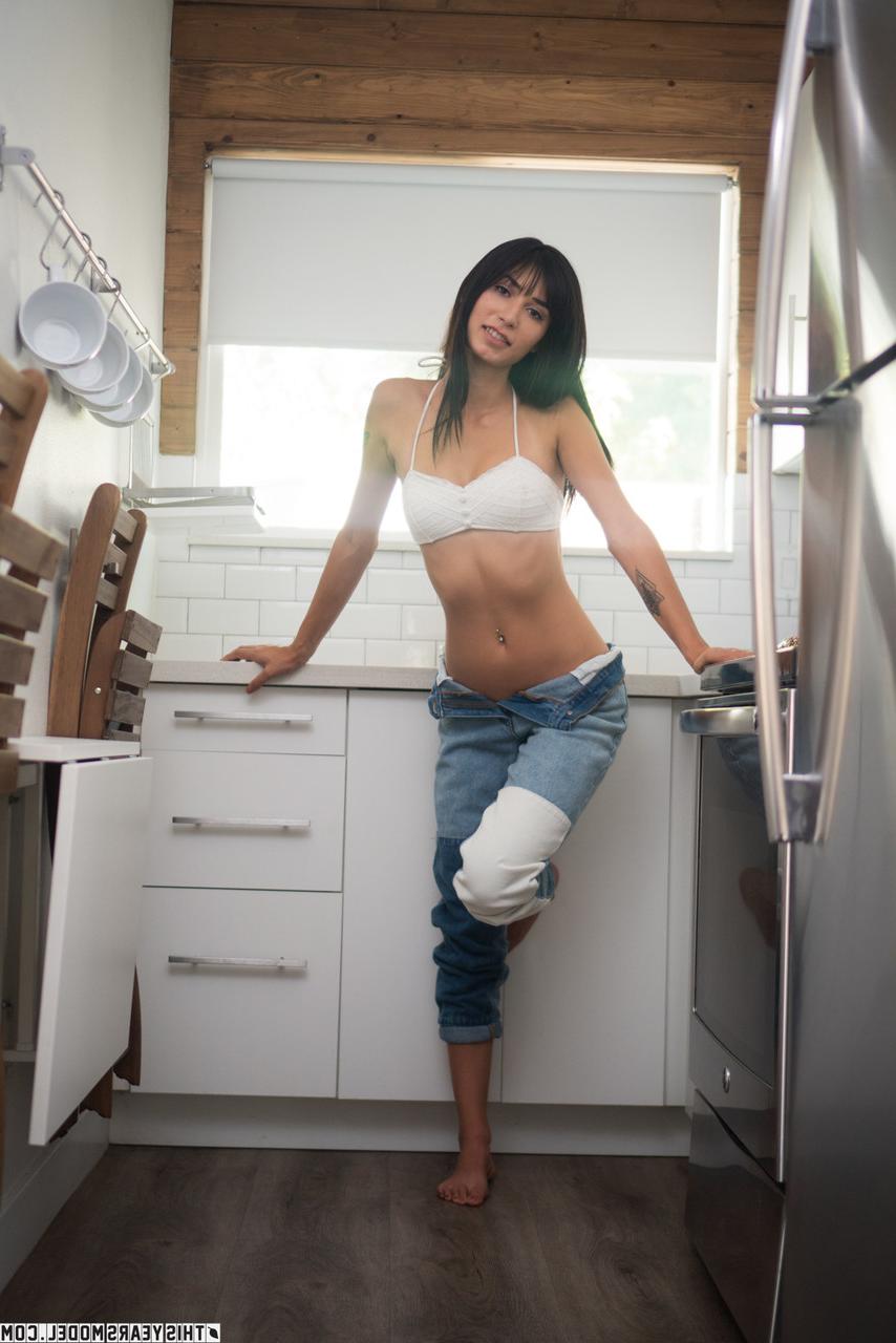10P Hot brunette Taylor Choe pulls down her jeans before showing her tits