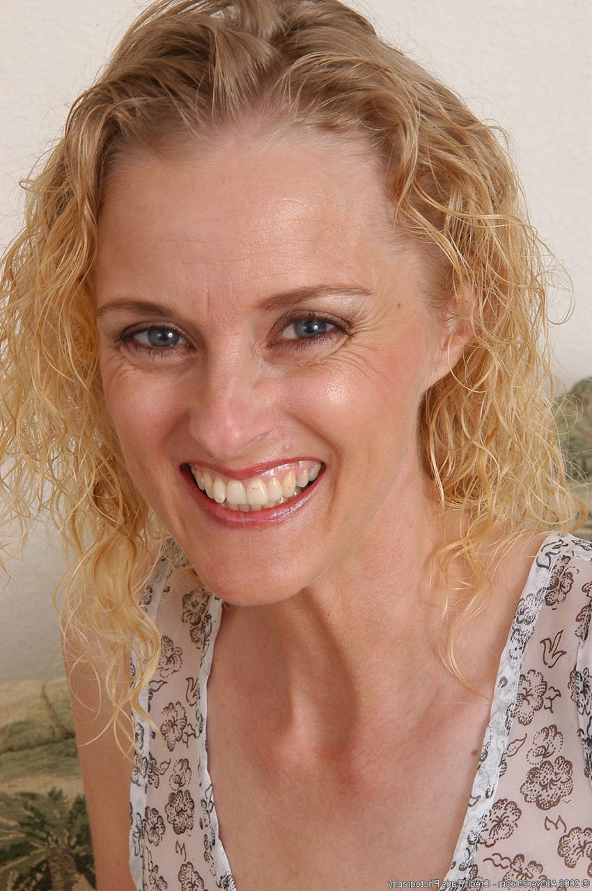 20P Curly-haired MILF Kira unveiling her tiny tits, mature holes & big booty