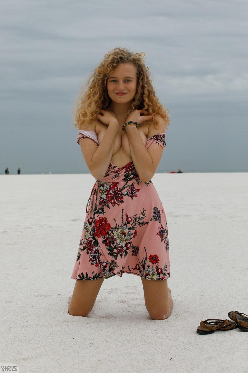 13P Curly haired babe Debra Kenlow flashes her tiny tits & her hot ass outdoors