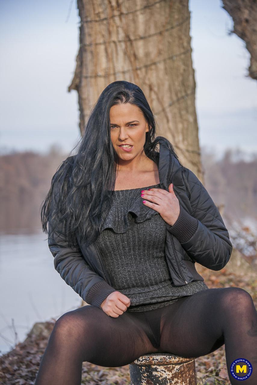 20P Sexy Hungarian MILF Simony Diamond flashes her crotch in black pantyhose
