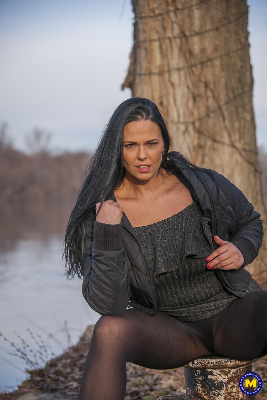 20P Sexy Hungarian MILF Simony Diamond flashes her crotch in black pantyhose
