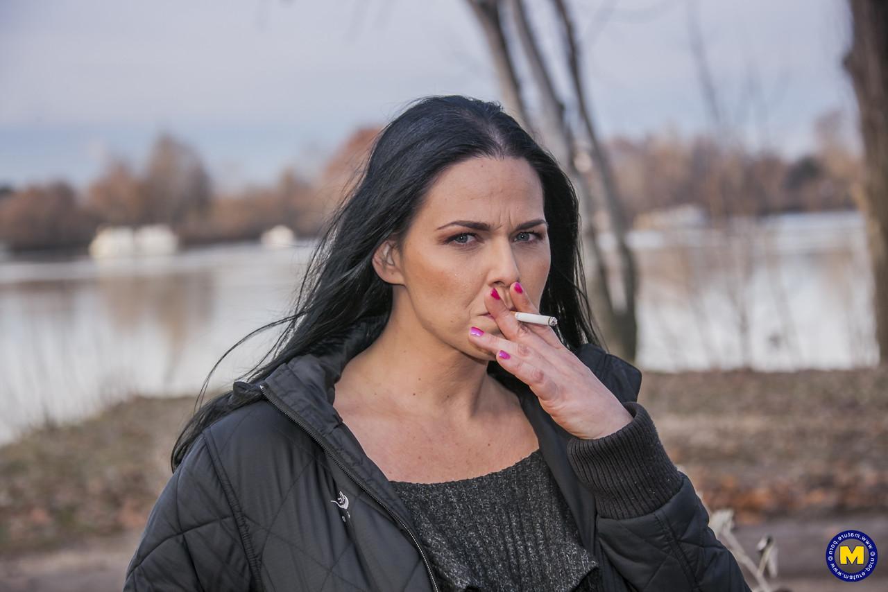 20P Sexy Hungarian MILF Simony Diamond flashes her crotch in black pantyhose