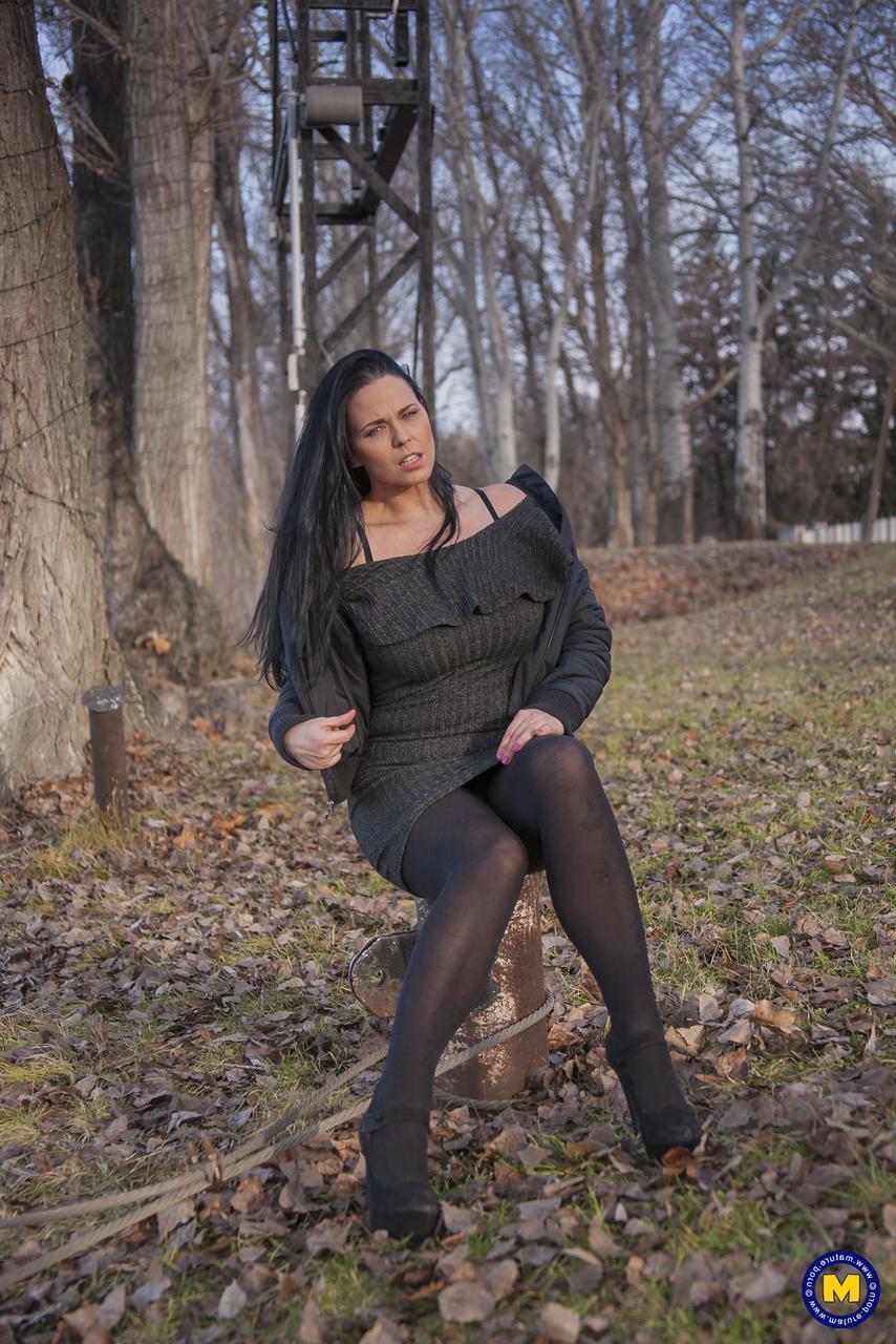 20P Sexy Hungarian MILF Simony Diamond flashes her crotch in black pantyhose