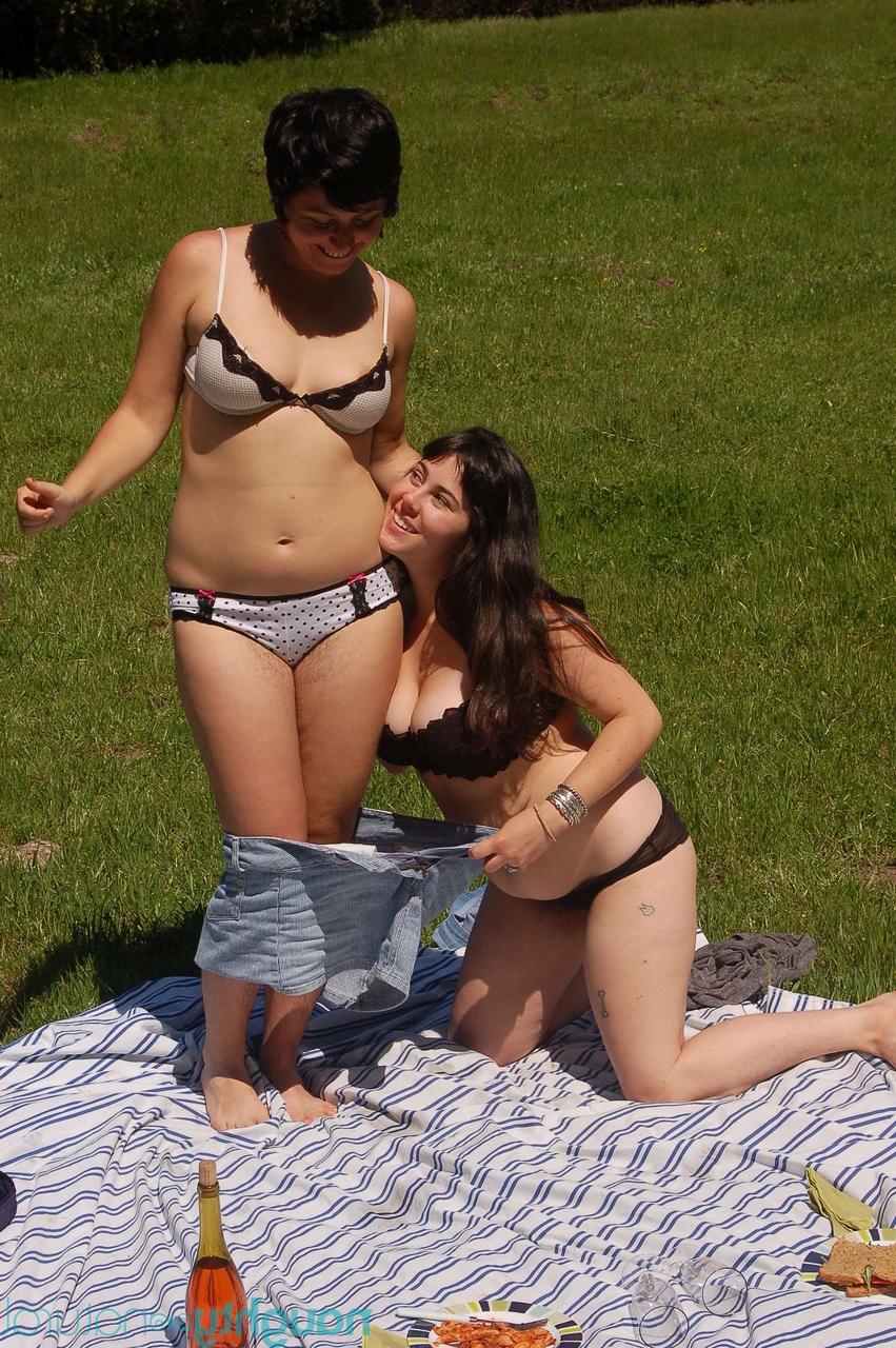 20P Young honeys Nikki Silver and Cleo undress and pose nude on a picnic