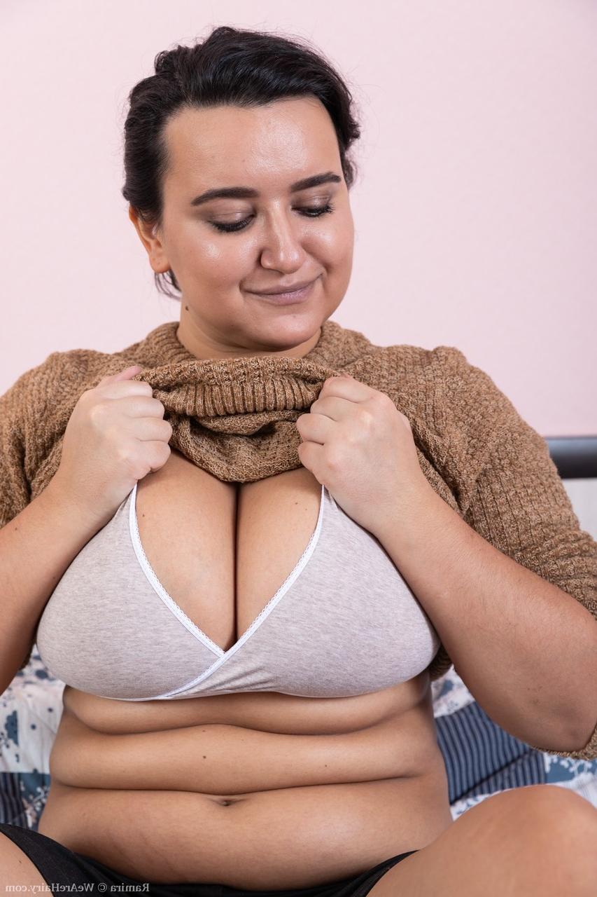20P Chubby hottie Ramira strips in the bedroom & shows her huge tits & hairy twat