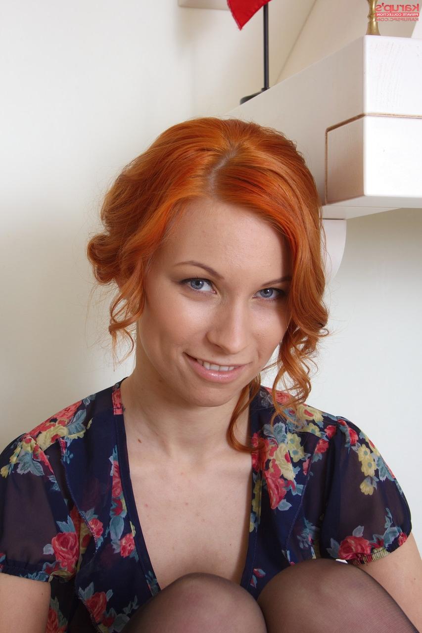 20P Beautiful redhead Daisy A shows her nice tits & her shaved cunt in stockings