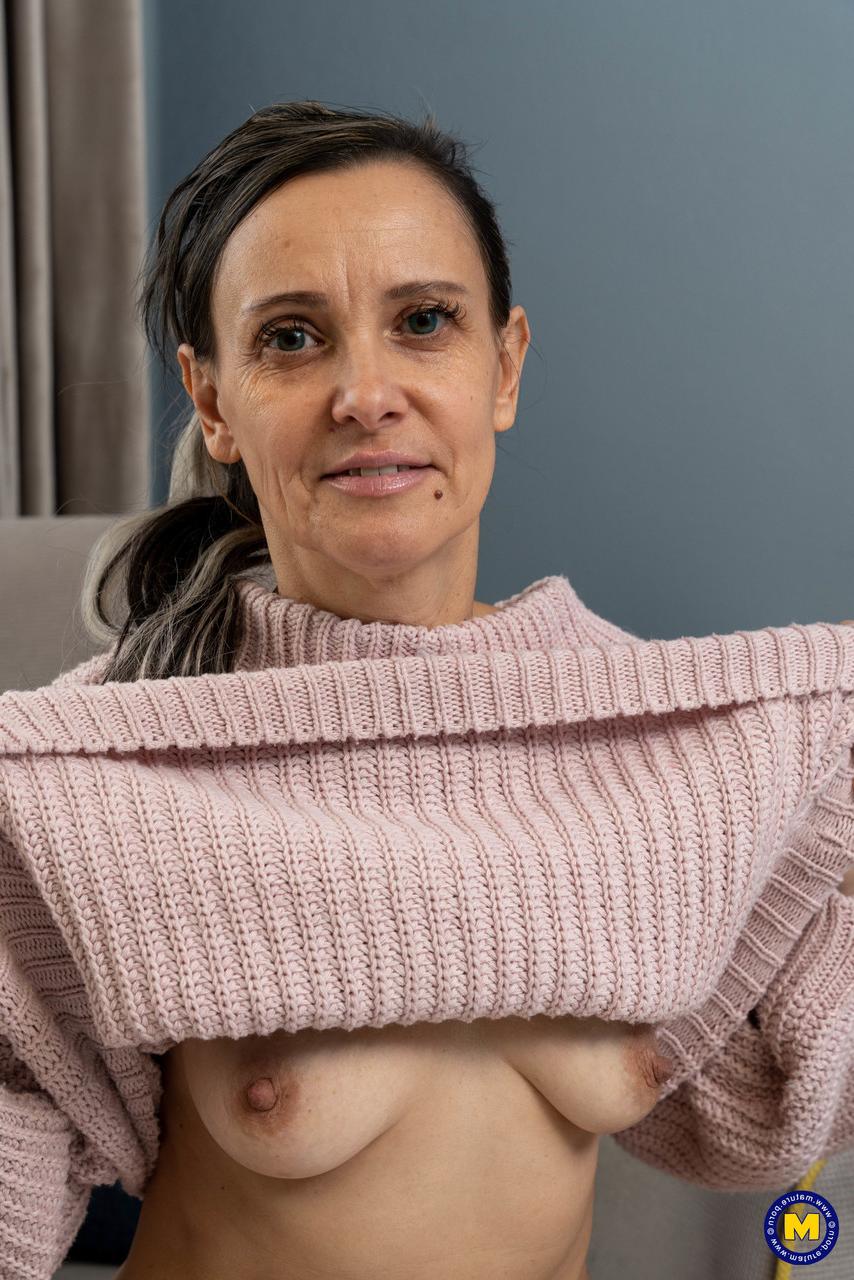 20P Pretty granny Gerda Ice strips down naked and sucks and fucks a toy
