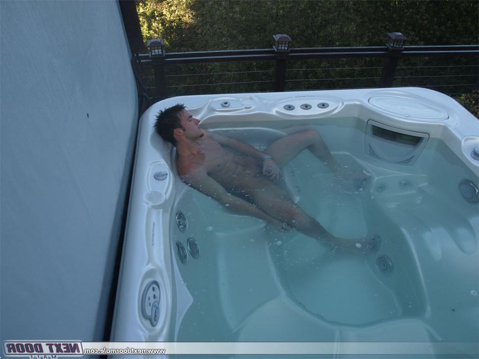 20P Insatiable brunette Trystan Bull jerks off in the jacuzzi & in the living room