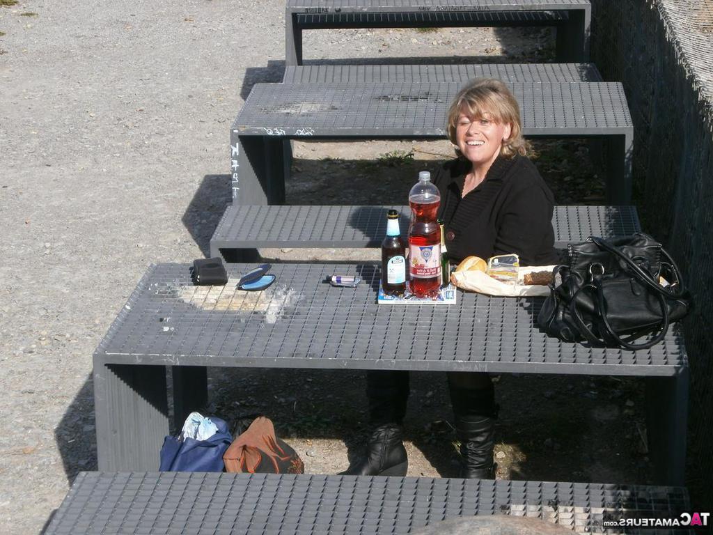 20P Older blonde amateur Caro exposes her big tits and underwear while outside