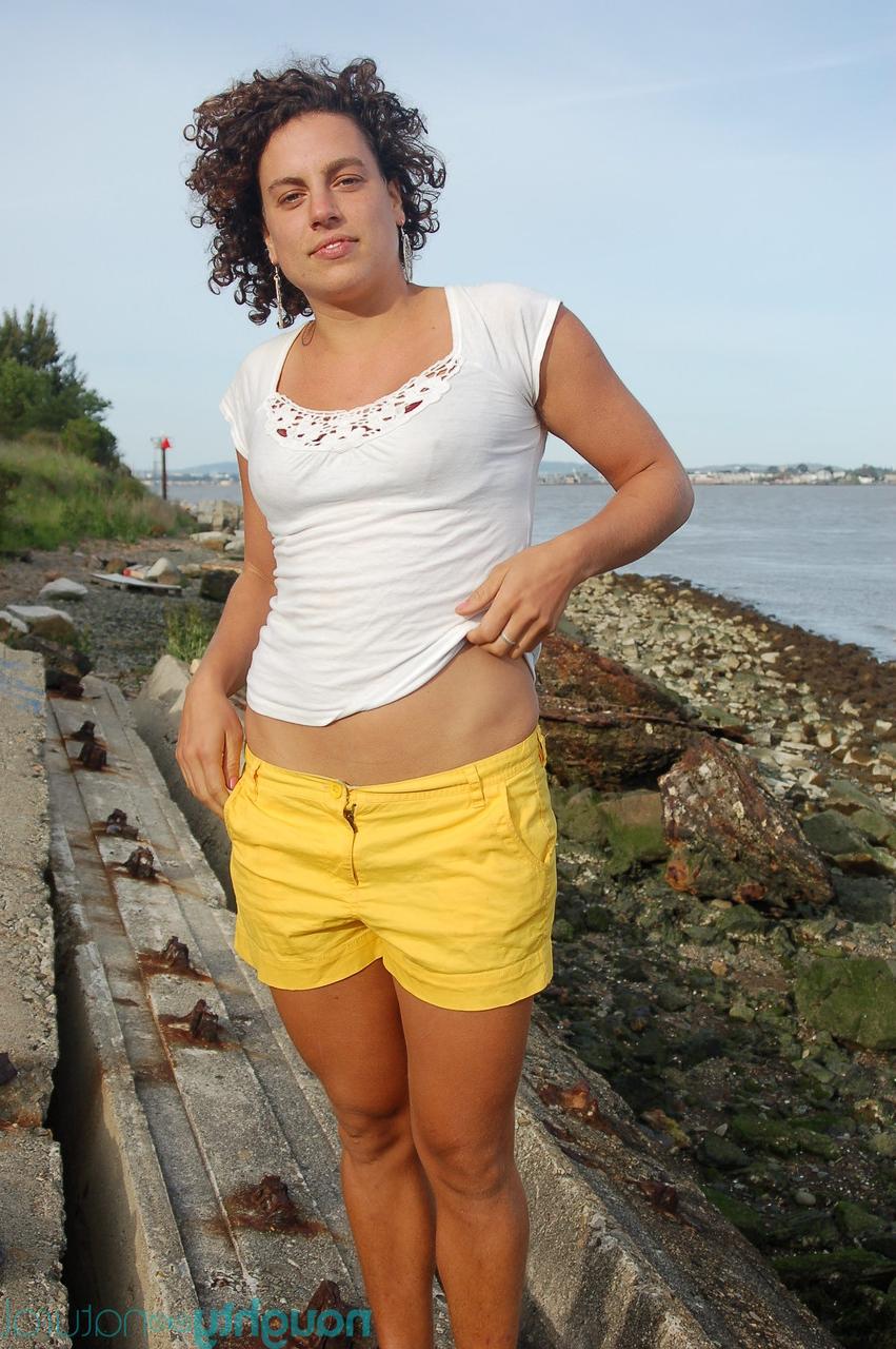 20P Curvy-haired beauty Sage strips and unveils her tanned hairy body in public