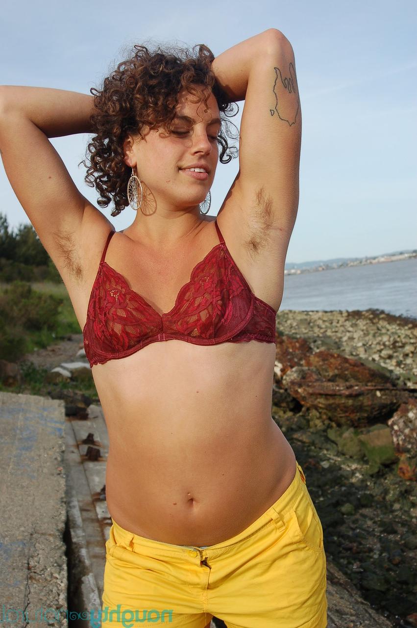 20P Curvy-haired beauty Sage strips and unveils her tanned hairy body in public