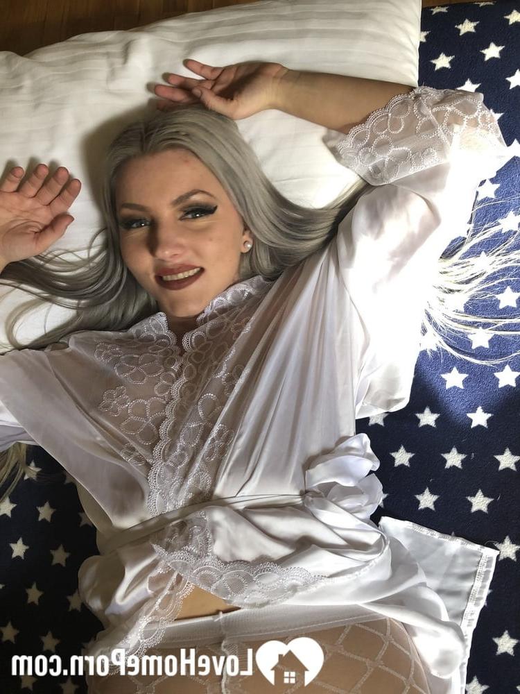 20P Lovely blonde is all smiles while showing her big boobs & her shaved pussy