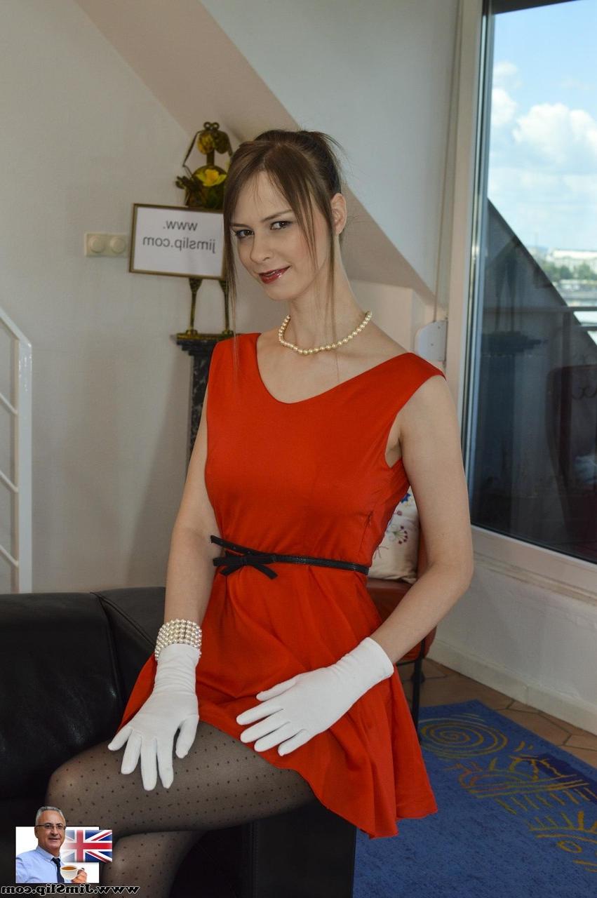17P Elegant hottie Coco in white gloves rips pantyhose to display shaved pussy