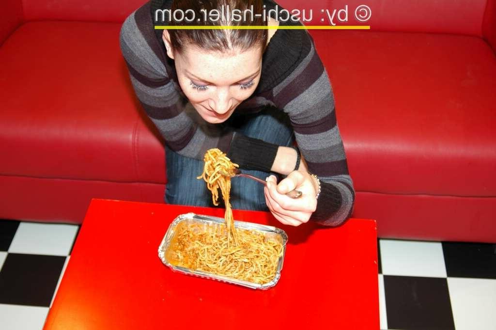 16P Julia Extrem chows down on a feed of spaghetti during a gangbang