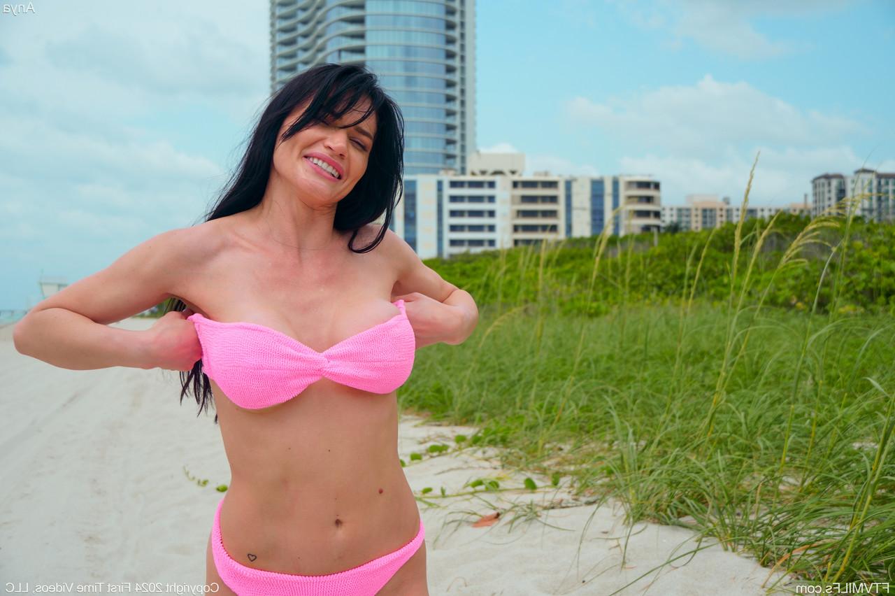 20P Curvaceous amateur MILF Anya stripping and posing naked on the sandy beach
