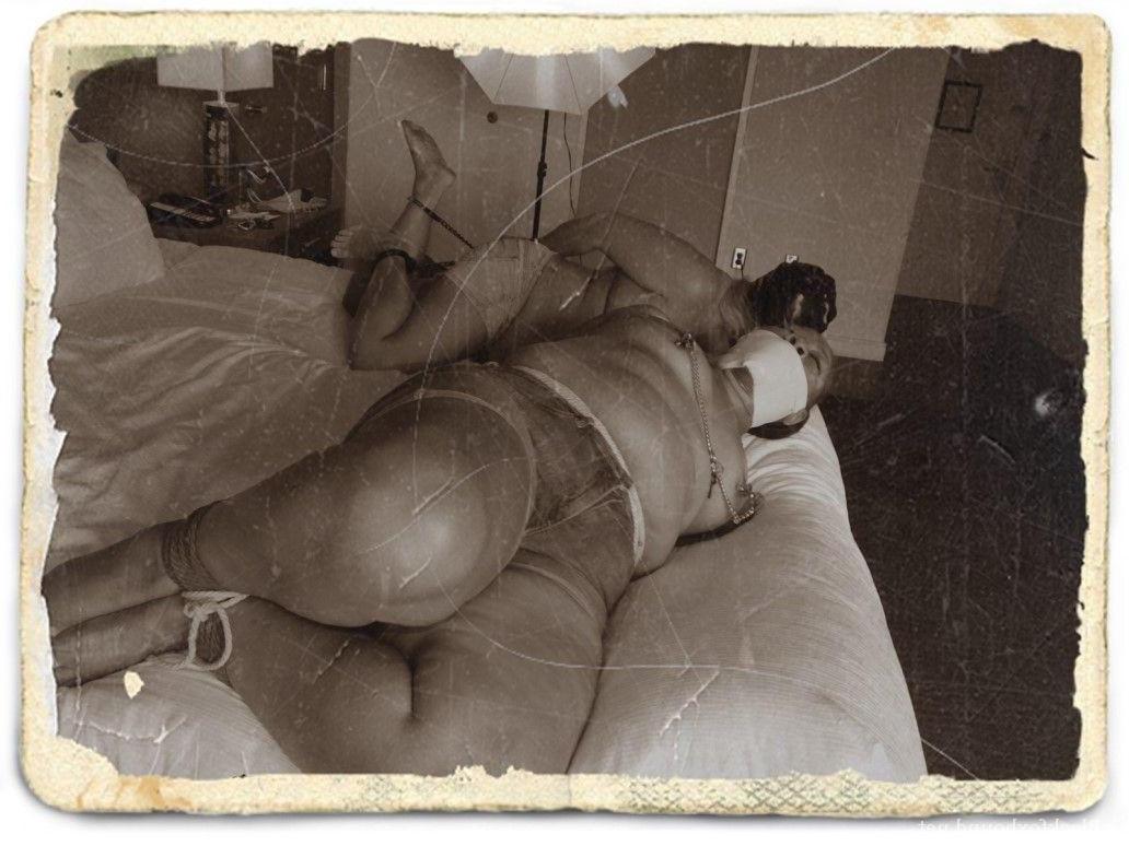 16P Ebony housewives are left gagged and bound on top of a bed