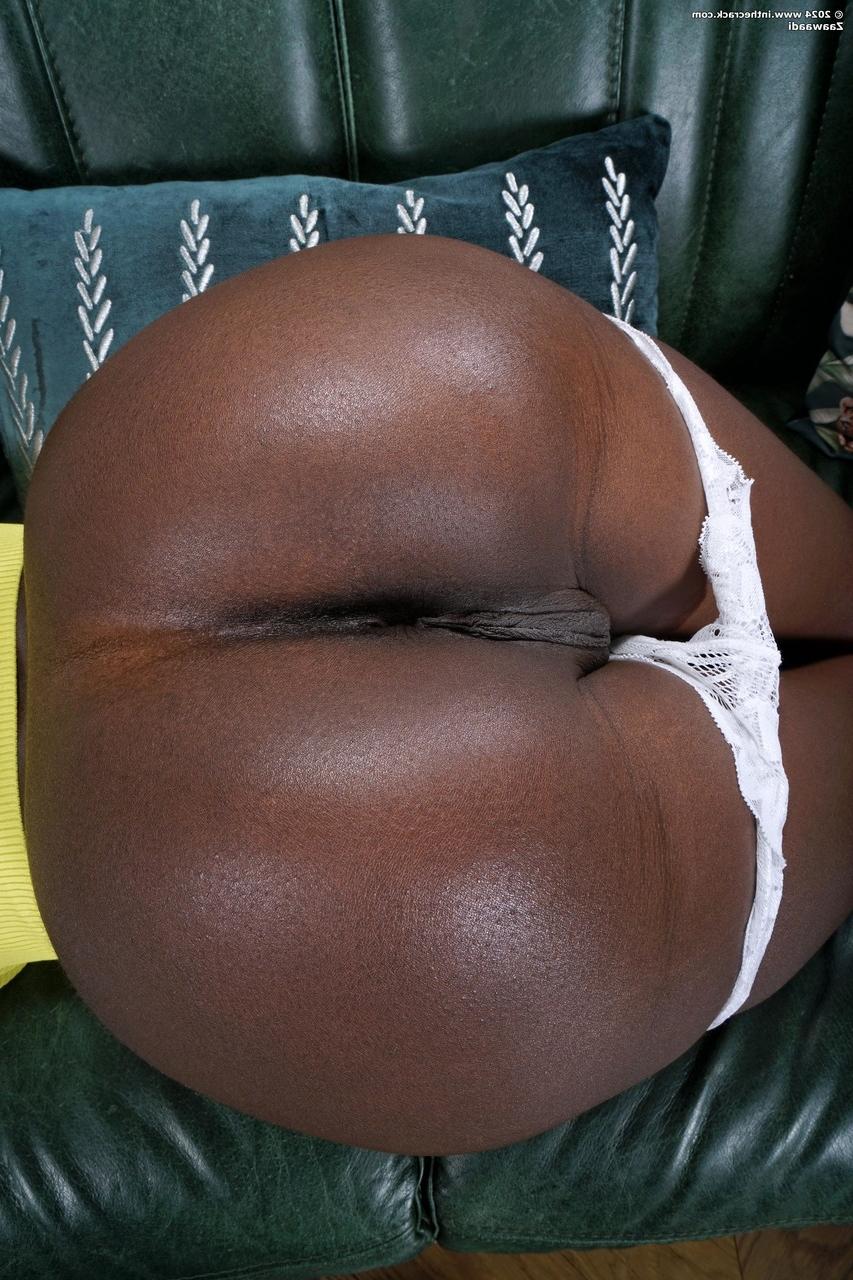 20P Gorgeous short haired ebony model Zaawaadi flaunts her shiny ass and big tits