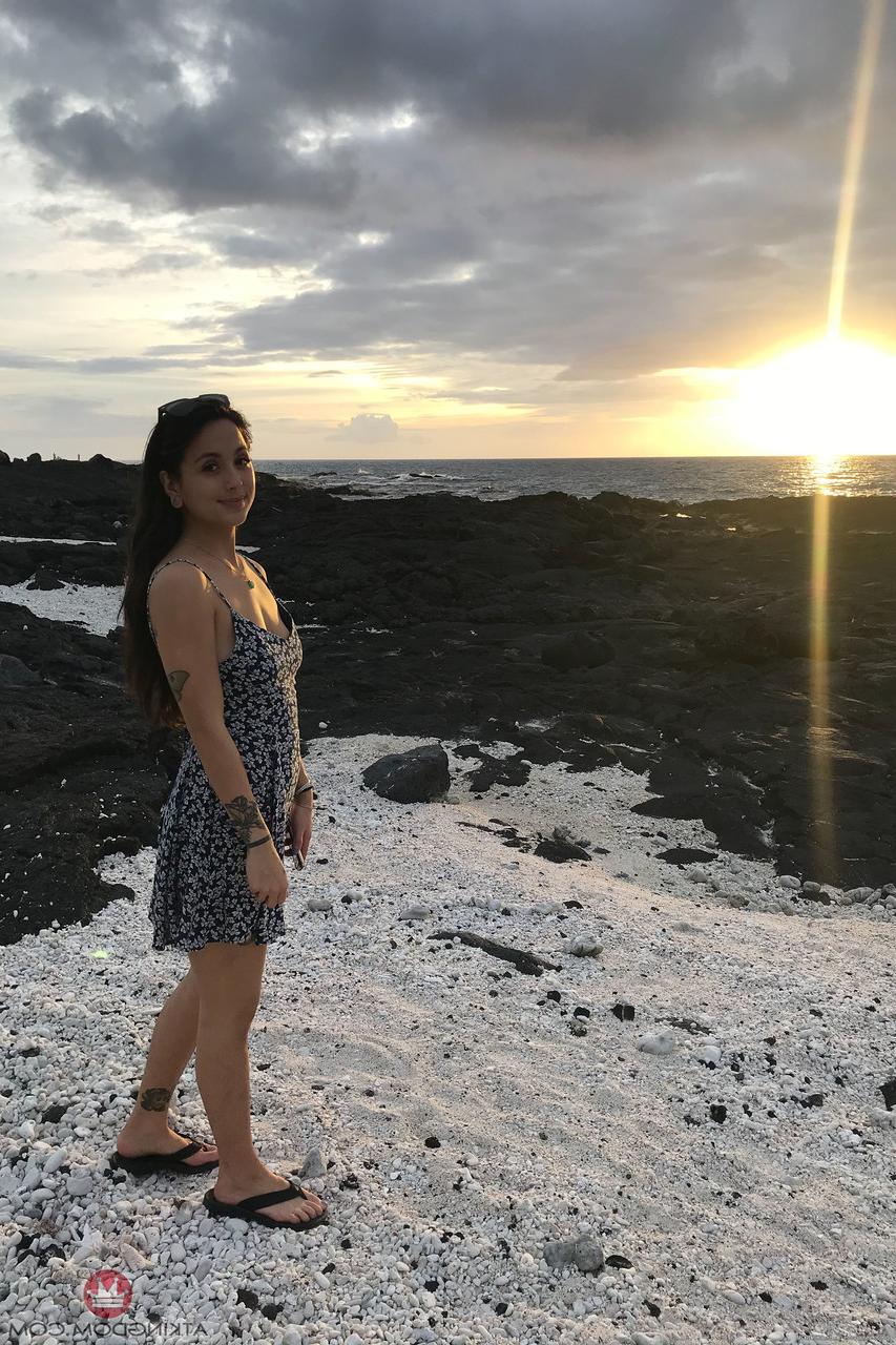20P Teen Mi Ha Doan flashes her tits and exposes her hairy pussy on the beach