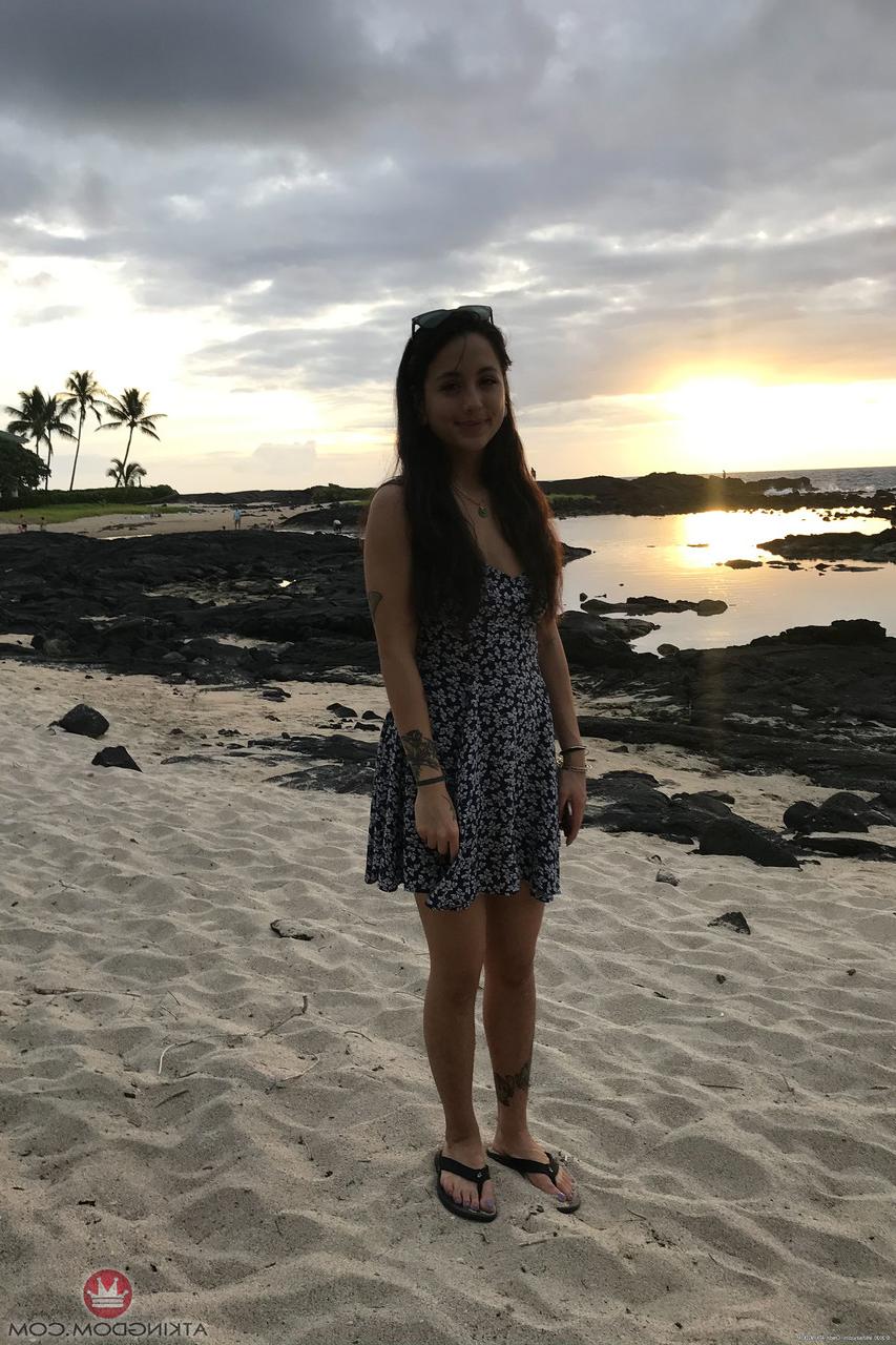 20P Teen Mi Ha Doan flashes her tits and exposes her hairy pussy on the beach