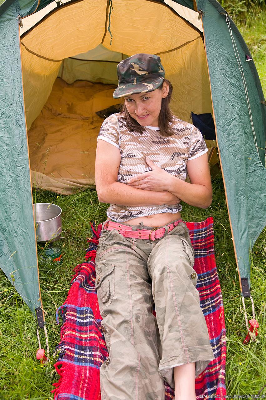 20P MILF Caylian Curtis strips off her military outfit and poses while camping