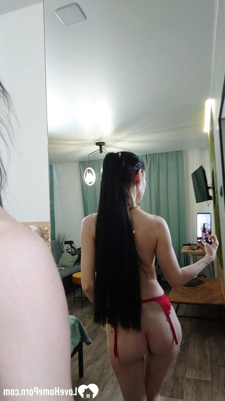 20P Brunette MILF with a ponytail seductively posing half naked in the mirror