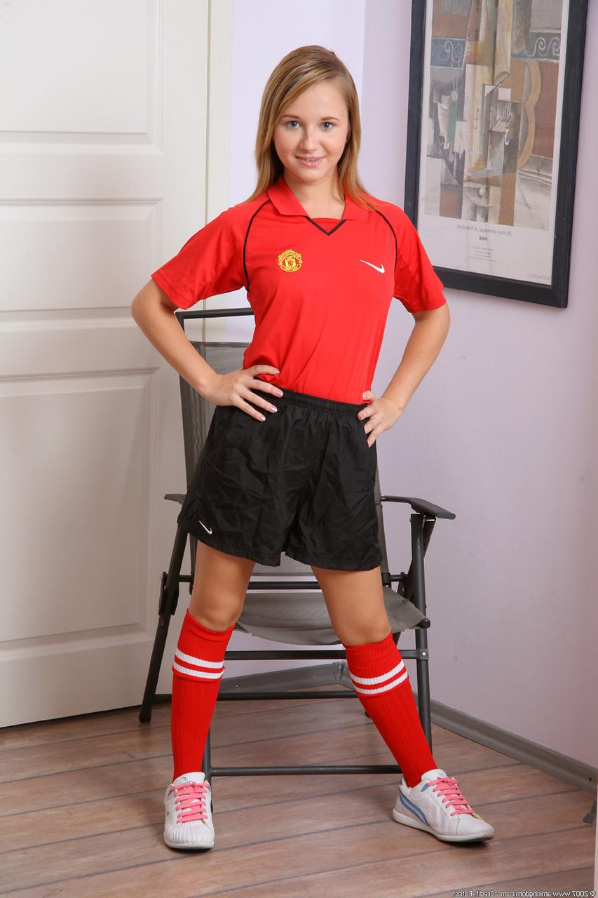 20P Petite soccer player Olga takes off her uniform & spreads her shaved pussy