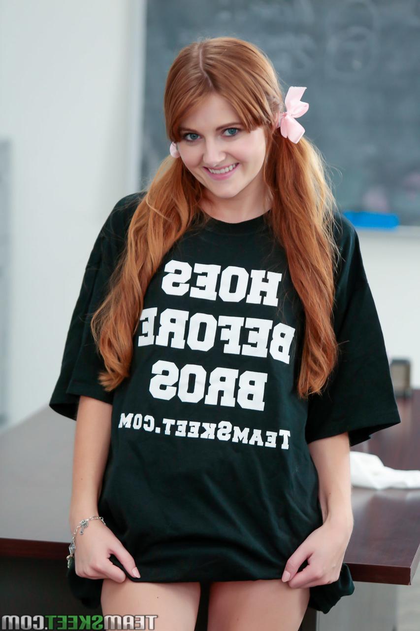 17P Pigtailed redhead student Miley Cole undresses to play nude on teacher's desk