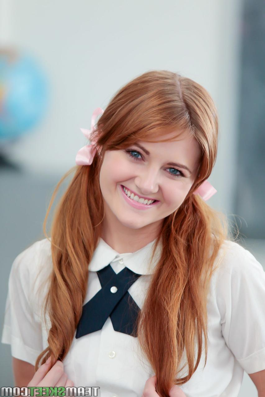 17P Pigtailed redhead student Miley Cole undresses to play nude on teacher's desk